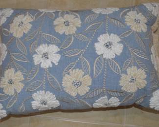 Embroidered pillows and other throw pillows