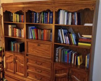 Three piece shelf unit, books on music