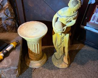 sculpture of women pouring water and base