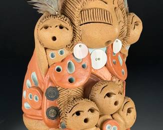Navajo Storyteller Pottery by Cheyenne Jim - Handcrafted Native American Art
