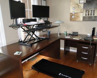 The desk is for sale as well, and matches the file and storage systems