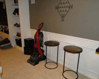 Pair of nice round end table, and a steam cleaner for the carpet and some wall art for the wall