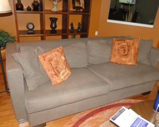 Comfortable couch with decorative throw pillows