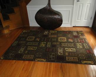 This unique rug is also for sale as well