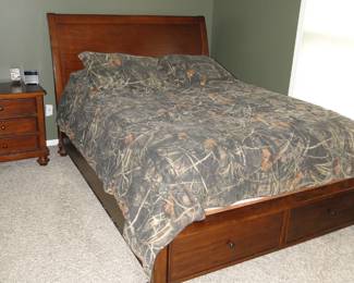 Another Queen bedroom. set, this one has storage drawers at the foot of the bed. Of you know, additional storage