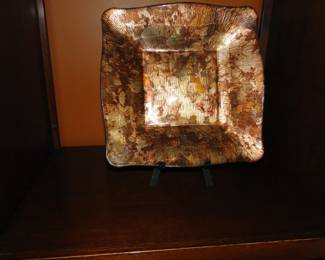 Square decorative plate, can also be set on a table as well. Because sometimes it gets tiring standing up