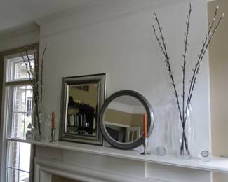 Fun and whimsical decorative items, perched nicely on the mantle