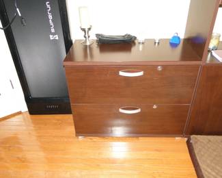 Large wooden file cabinet.  For legal, and standard files
