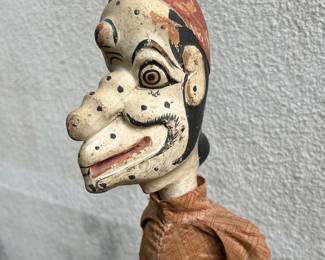 Several vintage and antique puppets of different styles