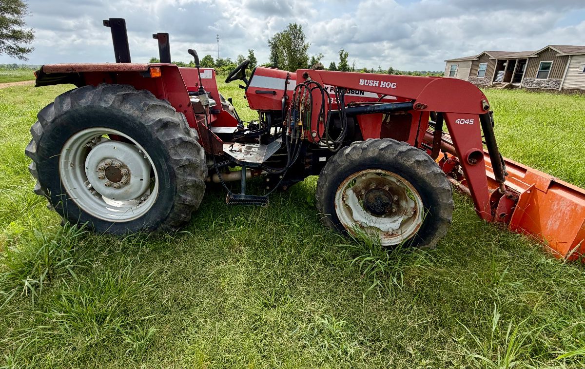 2008 Massey Ferguson 583 with 4045 Bush Hog Front Loader. Less than 2600 hours