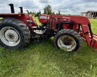 2008 Massey Ferguson 583 with 4045 Bush Hog Front Loader. Less than 2600 hours