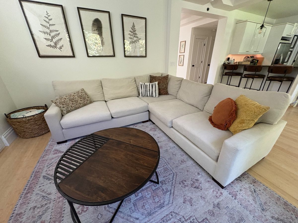 Pottery Barn Sectional Couch, coffee table, framed art