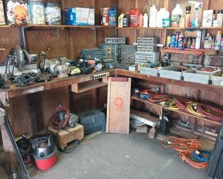 Craftsmen 10” miter saw, bench grinders, Ryobi 18 b, bench vise, creeper small shop vac, air compressor, gas cans, hand tools
