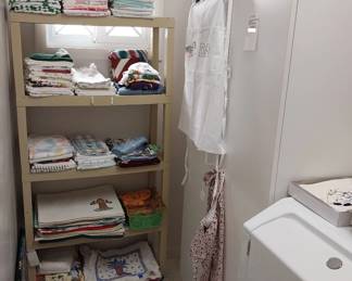 towels, place mats, storage cabinet
