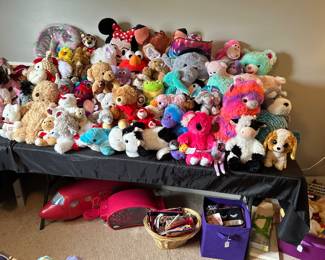 Stuffed animals, vintage Barbie, wallets and wristlets 