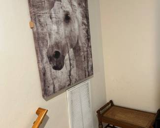 Wooden cane bench and horse wall art 