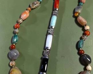 Polished Stone Necklace Complementing Bracelet