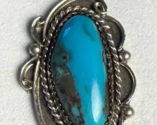 Teardropshaped turquoise stone pendant artist signed