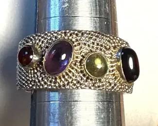 Sterling ranulated band ring featuring multicolored oval stones