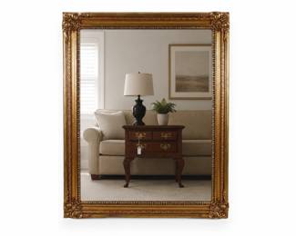Large Rococo Revival Gilt Wood and Composition Framed Wall Mirror