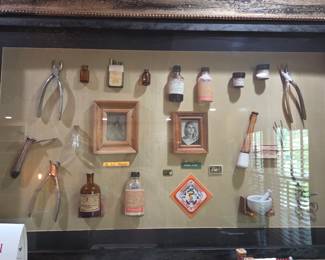 Antique pharmacy relics in custom shadow box