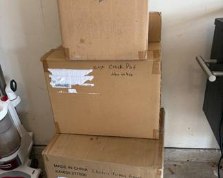 Pressure cooker, crockpot, and turkey fryer new in boxes