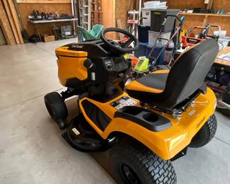 One year old Cub Cadet riding mower, like new