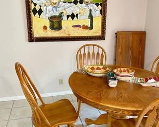 round table, one leaf, 4 chairs