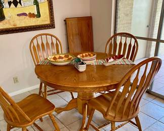 round table, one leaf, 4 chairs