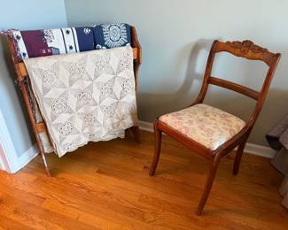 quilt rack, quilts, antique chair