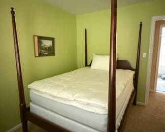 Mahogany full size pencil post bed with mattress