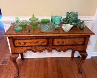 Antique English Oak Queen Anne lowboy, colored depression glass, cabbage salad set, art pottery