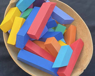 Lot 25: Colorful wooden blocks and a decorative carved gourd bowl