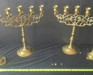 Lot 55: Brass candelabras and candlesticks