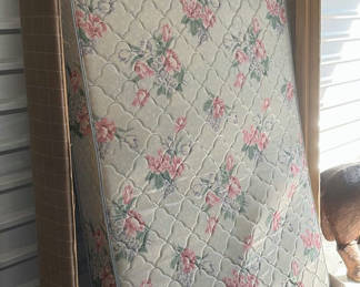 Lot 40: Floral quilted mattress with wrapped wooden frame