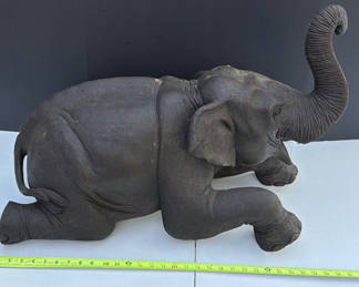 Lot 201: Dark elephant statue with raised trunk