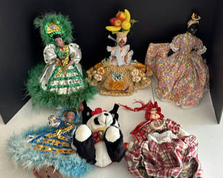 Lot 130: Collection of Decorative Cloth Dolls and Plush Panda
