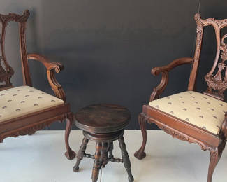 Lot 76: Two carved wooden doll chairs with a round side table