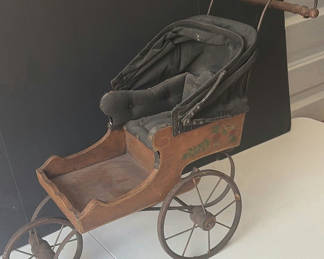 Lot 91: Antique doll carriage