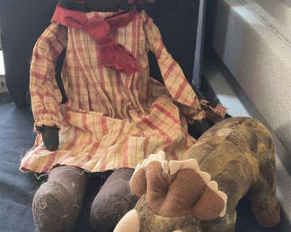 Lot 42: Rag doll and brown dinosaur plush toy