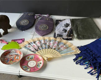 Lot 66: Carved bear, porcelain plates, fan, pouches and scarves – assorted decor and accessories