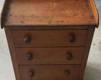 Lot 32: Wooden three-drawer chest with tray-style top