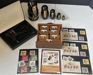 Lot 219: Presidential Matryoshka Dolls, Vintage Drawer Cabinet, Vietnam Stamp Collection, and Corkscrew Set