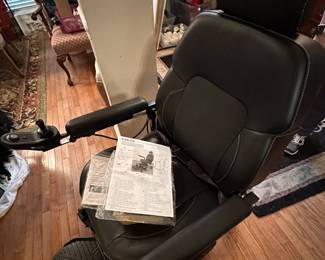 Like New Merits Motorized Wheelchair with Battery & Book