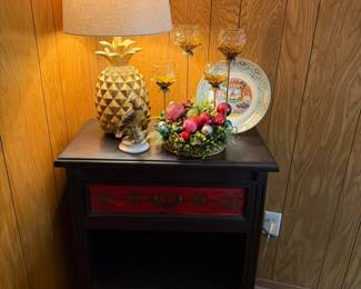 Accent furniture piece with storage, pineapple lamp, vintge Christmas candle/floral decoration
