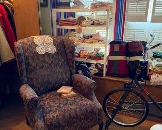 Upholstered arm chair, lots of vintage linens, kitchen, doilies, runners, throws