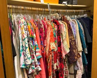 Ladies clothing in hall closet, vintage Kodak slide projector and cassettes