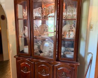 Vintage lighted china cabinet with glass shelves and mirror back, lots of storge and in great condition