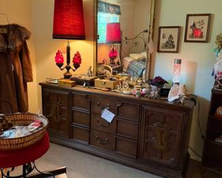 Looking at the Stanley Furniture Co. Vintage Mediterranean Revival style dresser with fitted storage drawers