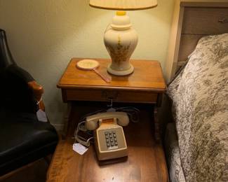Vintage solid wood side table with storage, vintage telephone, ceramic lamp